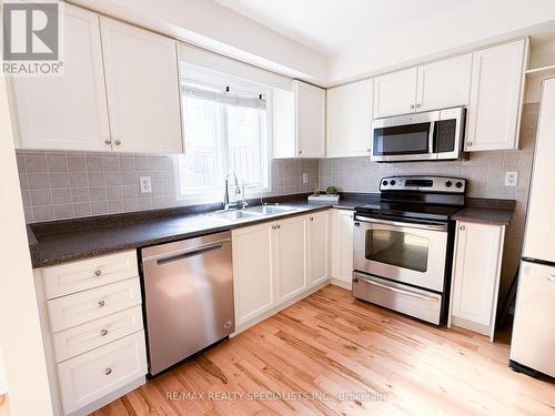 7 - 130 Tenth Street, Toronto, ON - Indoor Photo Showing Kitchen With Stainless Steel Kitchen With Double Sink