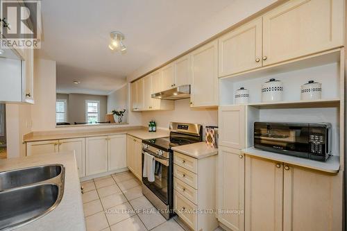 2225 Hummingbird Way, Oakville, ON - Indoor Photo Showing Kitchen With Double Sink