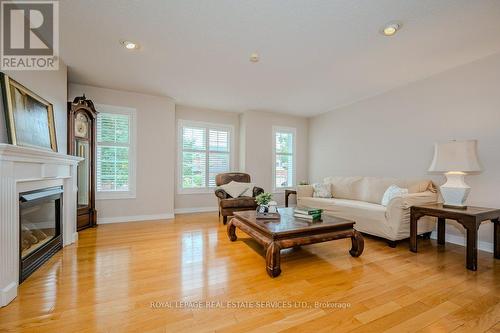 2225 Hummingbird Way, Oakville, ON - Indoor Photo Showing Living Room With Fireplace