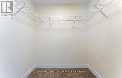 2nd - Master Bedroom - Walk in Closet - 10111 Oxbow Drive, Middlesex Centre (Komoka), ON - Indoor With Storage