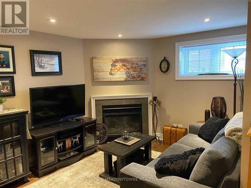 50 Hidden Lake Trail, Halton Hills, ON - Indoor Photo Showing Living Room With Fireplace