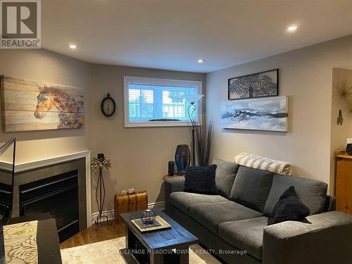 50 Hidden Lake Trail, Halton Hills, ON - Indoor Photo Showing Living Room With Fireplace