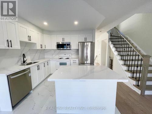 1 - 5530 Glen Erin Drive, Mississauga, ON - Indoor Photo Showing Kitchen With Double Sink