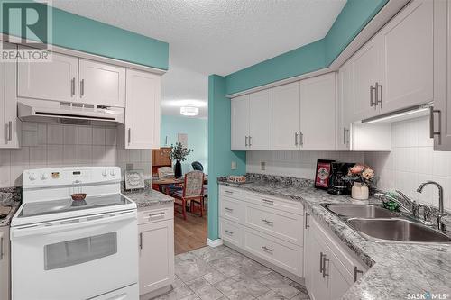 103 250 Athabasca Street E, Moose Jaw, SK - Indoor Photo Showing Kitchen With Double Sink