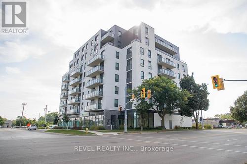 613 - 7 Erie Avenue, Brantford, ON - Outdoor With Balcony With Facade