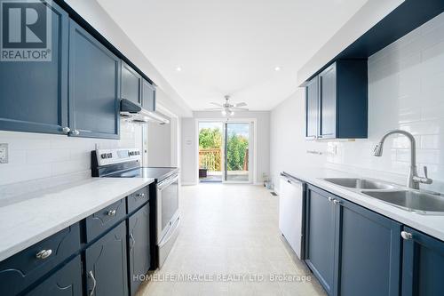 2023 Swan Street W, Innisfil, ON - Indoor Photo Showing Kitchen With Double Sink With Upgraded Kitchen