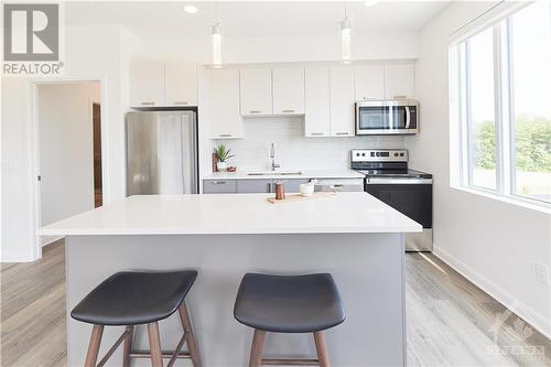 2055 Portobello Boulevard Unit#211, Ottawa, ON - Indoor Photo Showing Kitchen With Upgraded Kitchen