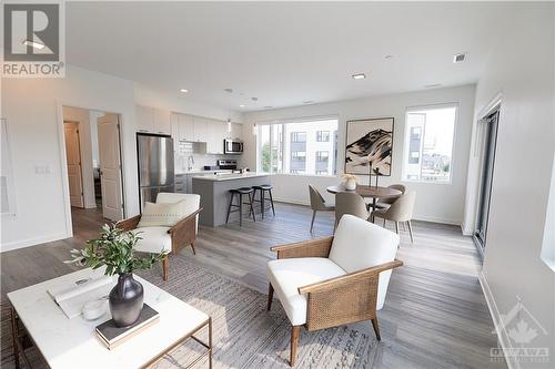 2055 Portobello Boulevard Unit#211, Ottawa, ON - Indoor Photo Showing Living Room