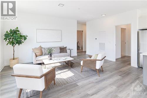 2055 Portobello Boulevard Unit#211, Ottawa, ON - Indoor Photo Showing Living Room