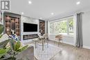 Upper - 541 East 16Th Street, Hamilton, ON  - Indoor Photo Showing Living Room With Fireplace 