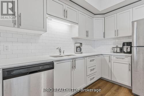 307 - 120 Summersides Boulevard, Pelham, ON - Indoor Photo Showing Kitchen With Upgraded Kitchen