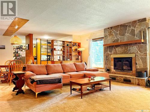 792 3Rd Street E, Shaunavon, SK - Indoor Photo Showing Living Room With Fireplace