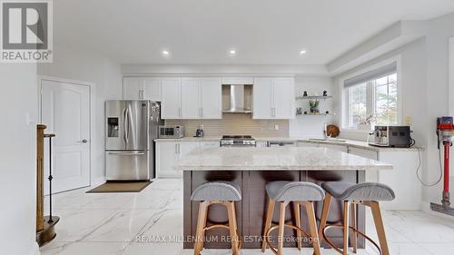 239 Vellore Woods Boulevard, Vaughan, ON - Indoor Photo Showing Kitchen With Upgraded Kitchen