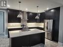 1619 Virtue Lane, Windsor, ON  - Indoor Photo Showing Kitchen With Double Sink With Upgraded Kitchen 