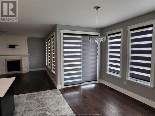 1619 Virtue Lane, Windsor, ON - Indoor Photo Showing Other Room With Fireplace