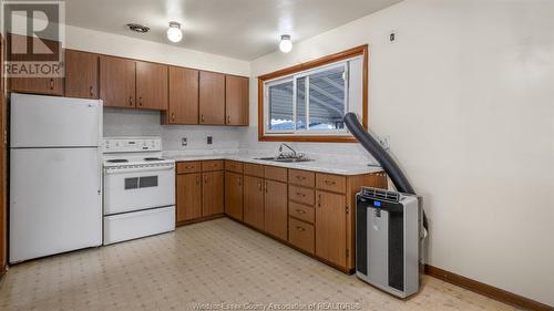 1694 George Avenue, Windsor, ON - Indoor Photo Showing Kitchen With Double Sink