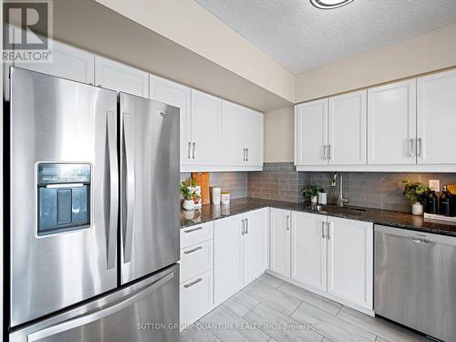 409 - 1000 Cedarglen Gate, Mississauga, ON - Indoor Photo Showing Kitchen With Stainless Steel Kitchen