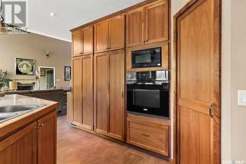 1 Emerald Creek Road, White City, SK - Indoor Photo Showing Kitchen With Double Sink