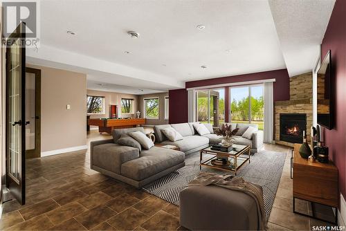 1 Emerald Creek Road, White City, SK - Indoor Photo Showing Living Room With Fireplace