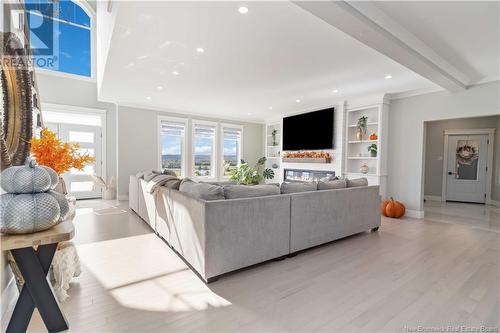 1354 105 Route, Douglas, NB - Indoor Photo Showing Living Room With Fireplace