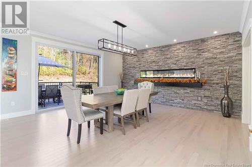 1354 105 Route, Douglas, NB - Indoor Photo Showing Dining Room With Fireplace