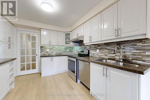 64 Alderbury Drive, Markham, ON - Indoor Photo Showing Kitchen With Double Sink With Upgraded Kitchen