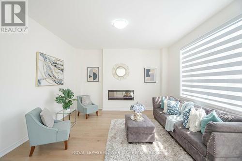 6 Coulterville Drive, Caledon, ON - Indoor Photo Showing Living Room With Fireplace