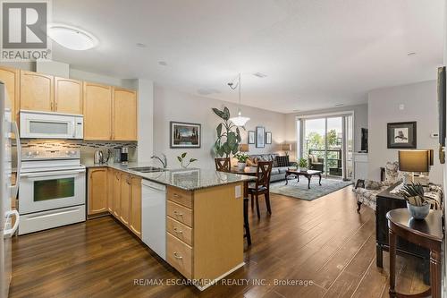 212 - 383 Main Street E, Milton, ON - Indoor Photo Showing Kitchen With Double Sink