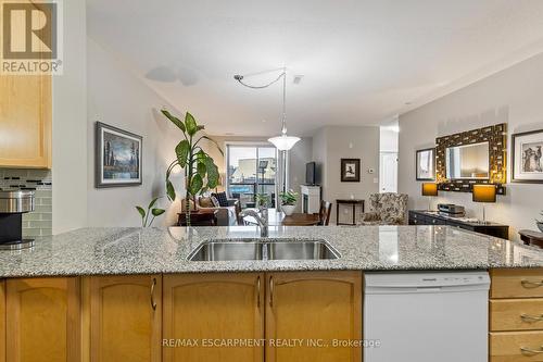 212 - 383 Main Street E, Milton, ON - Indoor Photo Showing Kitchen With Double Sink