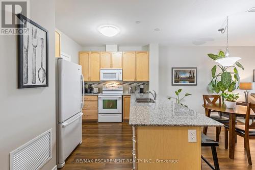 212 - 383 Main Street E, Milton, ON - Indoor Photo Showing Kitchen With Double Sink