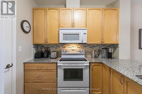 212 - 383 Main Street E, Milton, ON - Indoor Photo Showing Kitchen