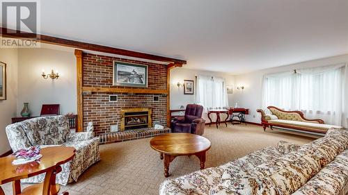 615 Marine Drive, Outer Cove, NL - Indoor Photo Showing Living Room With Fireplace