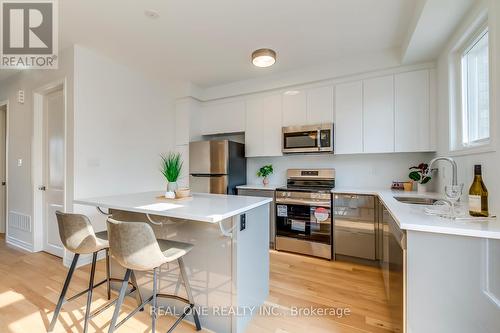 3044 Bramall Gardens, Oakville, ON - Indoor Photo Showing Kitchen With Stainless Steel Kitchen With Upgraded Kitchen