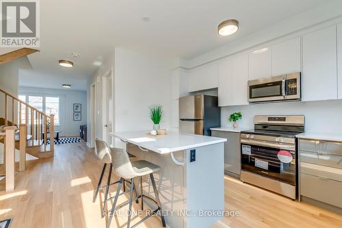 3044 Bramall Gardens, Oakville, ON - Indoor Photo Showing Kitchen With Stainless Steel Kitchen With Upgraded Kitchen