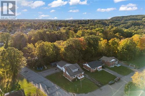 Wide driveway at double garage. Room for kids to play. - 48 Francis Street, Renfrew, ON - Outdoor With View