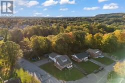 Wide driveway at double garage. Room for kids to play. - 