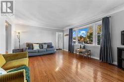 Living room with space for the adults and children. Hall left leads to 2 bedrooms and main bath. - 