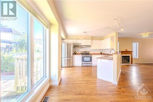 1205 Clyde Avenue, Ottawa, ON - Indoor Photo Showing Kitchen With Fireplace