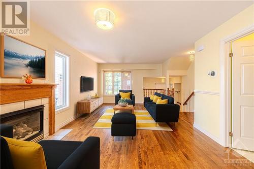 1205 Clyde Avenue, Ottawa, ON - Indoor Photo Showing Living Room With Fireplace