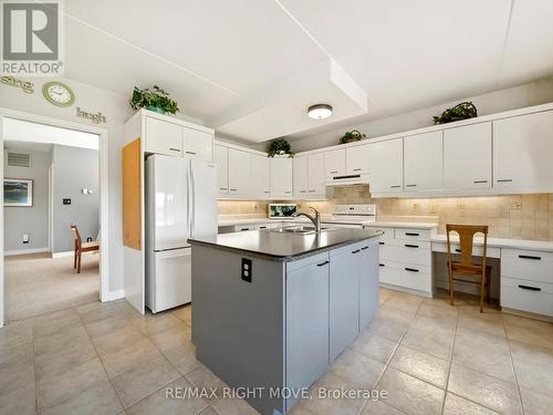 107 - 330 Brewery Lane, Orillia, ON - Indoor Photo Showing Kitchen