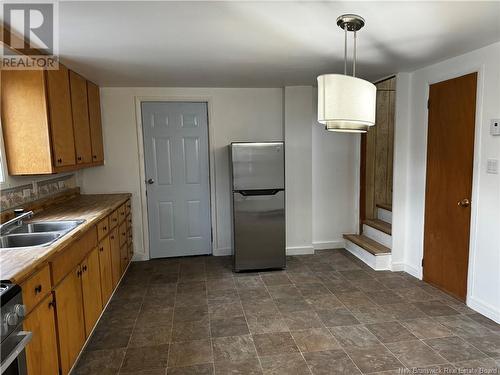 14 31E Avenue, Edmundston, NB - Indoor Photo Showing Kitchen With Double Sink