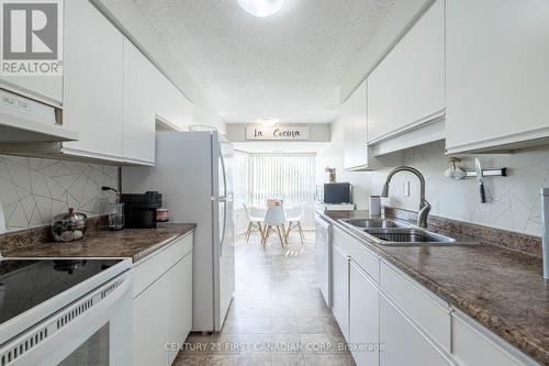 210 - 521 Riverside Drive, London, ON - Indoor Photo Showing Kitchen With Double Sink