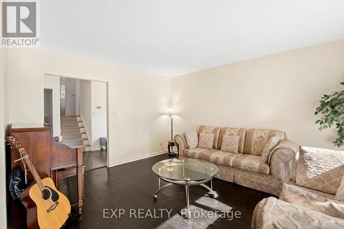 27 Blackbush Drive, Toronto, ON - Indoor Photo Showing Living Room