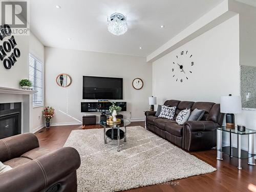 18 Yarmouth Street, Brampton, ON - Indoor Photo Showing Living Room With Fireplace