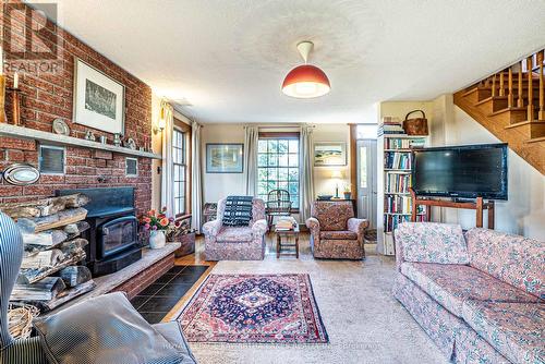 162 Grasshill Road, Kawartha Lakes, ON - Indoor Photo Showing Living Room With Fireplace