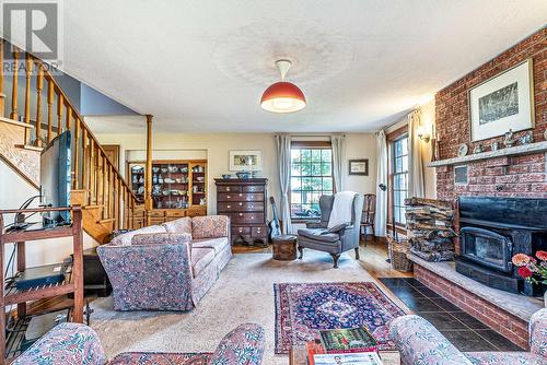 162 Grasshill Road, Kawartha Lakes, ON - Indoor Photo Showing Living Room With Fireplace