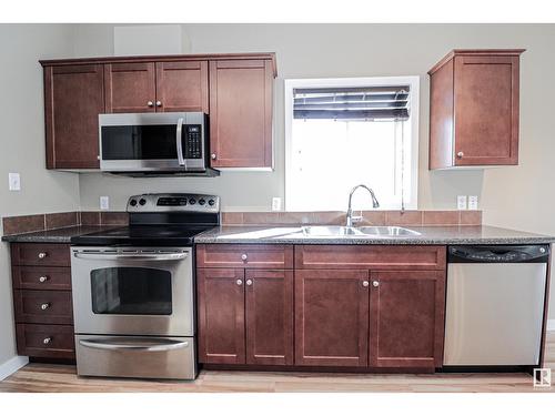 #3 11913 103 St Nw, Edmonton, AB - Indoor Photo Showing Kitchen With Double Sink