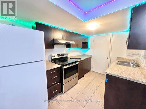 Bsmt - 21 Midvale Road, Brampton, ON - Indoor Photo Showing Kitchen With Double Sink