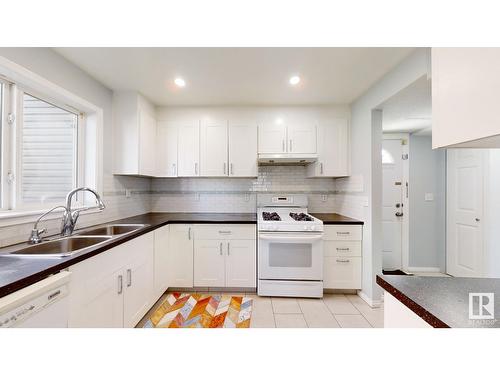 5642 19A Av Nw, Edmonton, AB - Indoor Photo Showing Kitchen With Double Sink