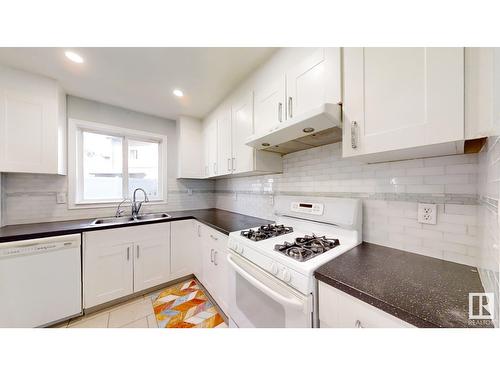 5642 19A Av Nw, Edmonton, AB - Indoor Photo Showing Kitchen With Double Sink